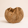 Lola™ | BOLSO REDONDO DE RAFIA TRENZADA CON CALADO