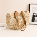 Lisa™ | BOLSO REDONDO DE RAFIA TRENZADA